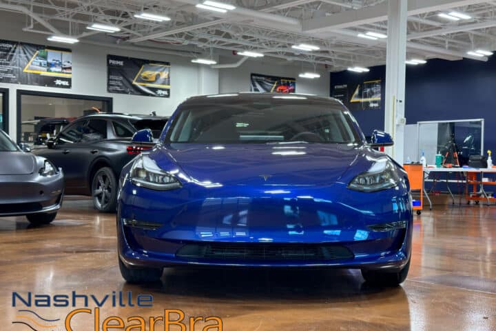 Tesla Model 3 Blue Xpel Paint Protection Film. Tesla Model 3 owners, especially those in Brentwood and Franklin, Tennessee, understand the importance of protecting their investment. With the increasing number of Teslas on the road, maintaining the pristine condition of your vehicle is more crucial than ever. At Nashville ClearBra, we specialize in applying XPEL Paint Protection Film (PPF) to ensure your Tesla Model 3 in Blue remains flawless. This blog post delves into the benefits of XPEL PPF, the services we offer, and why choosing Nashville ClearBra is the best decision for your Tesla Model 3.